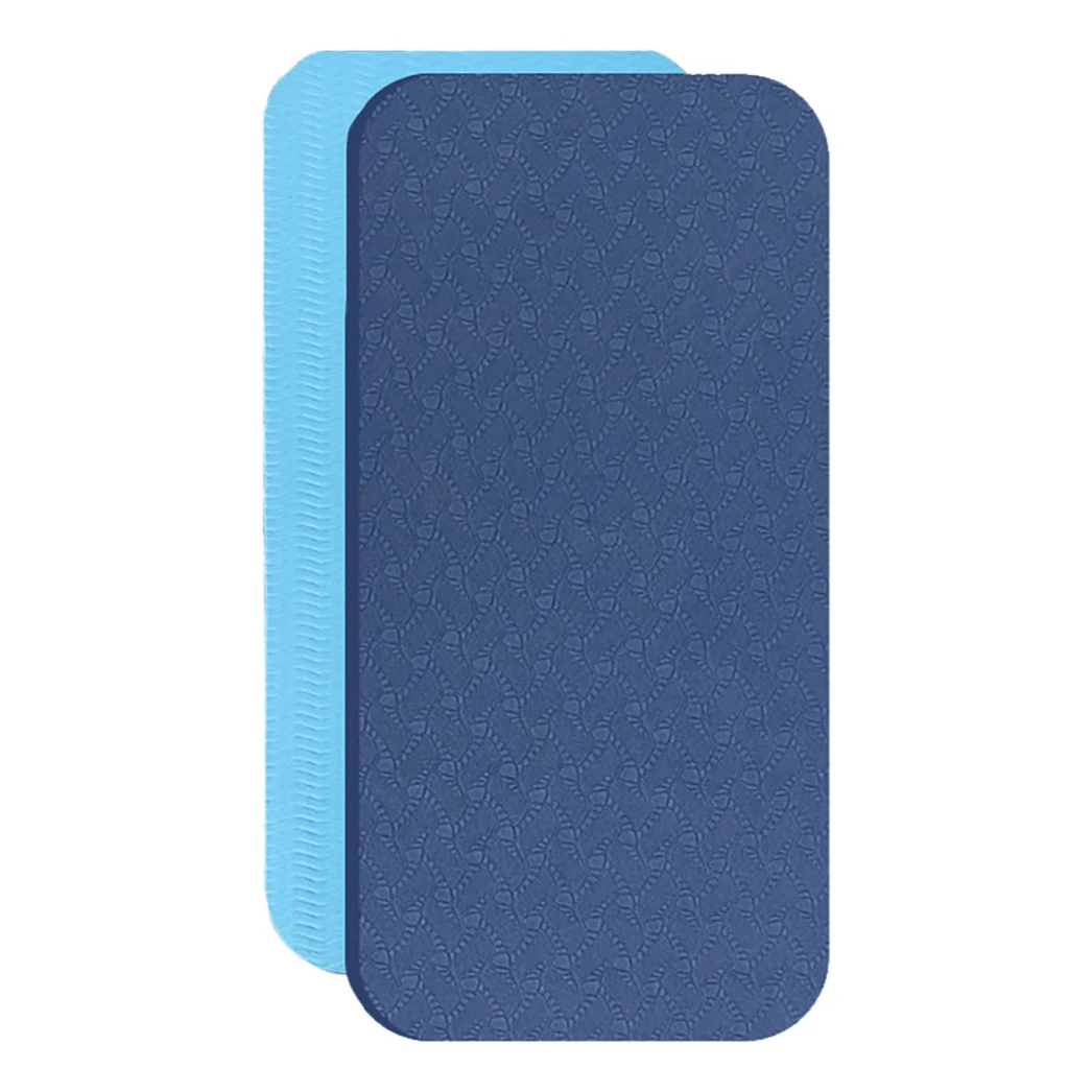 Two blue textured non-slip cushioned mats stacked on a white background